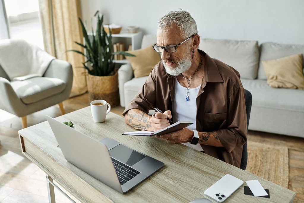 Online Therapist for LGBTQ in Dallas, Texas LGBTQ+ man in Austin, Texas takes notes during online therapy session