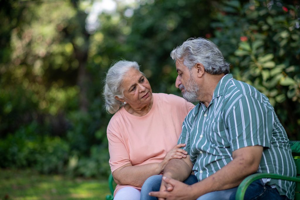 Texas Therapist for Depression in Seniors a senior-age man who looks sad or depressed is comforted by a woman around the same age